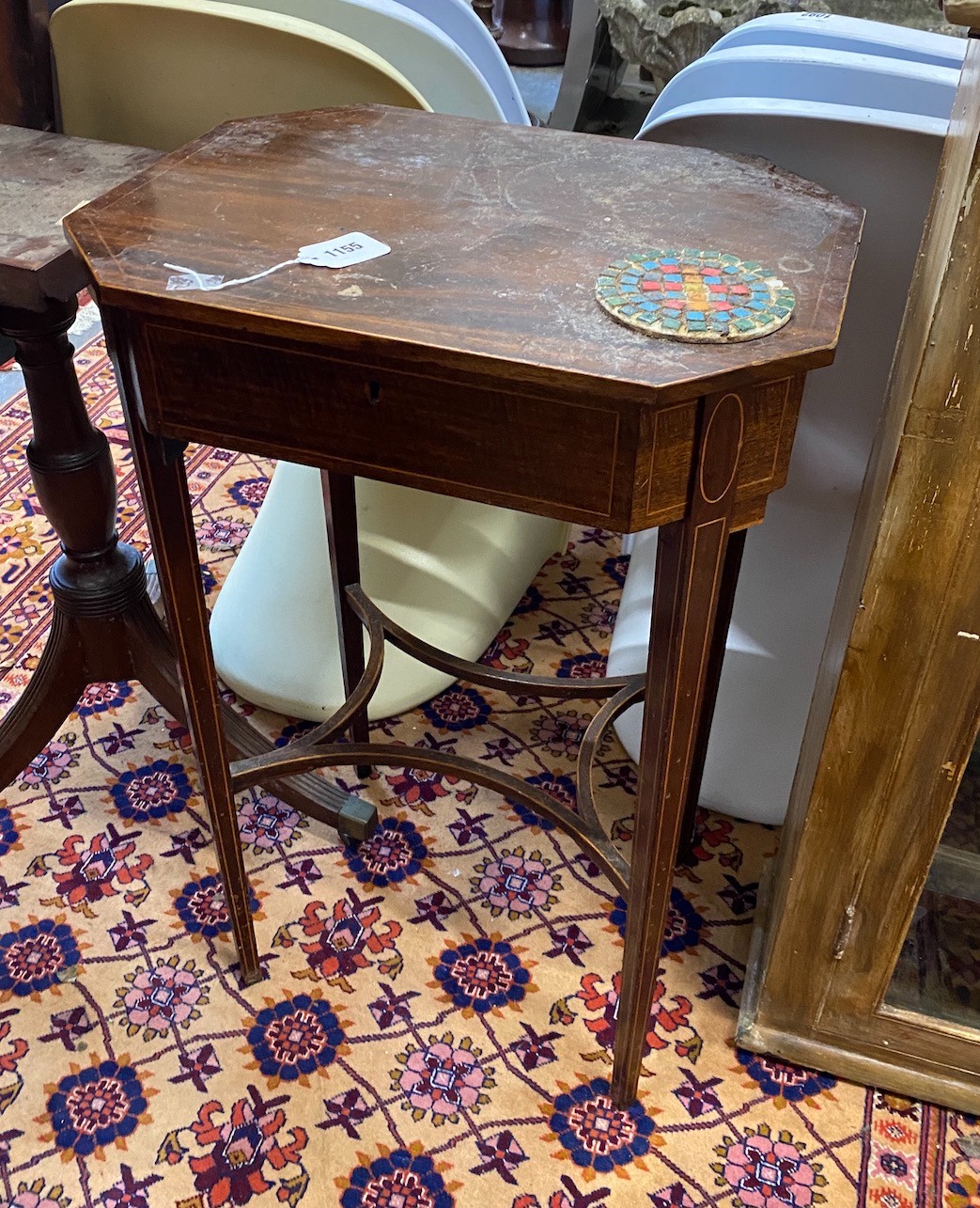 A George III octagonal mahogany work table, width 48cm, depth 37cm, height 78cm